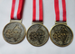 HC Andersen のマラソン メダルをとダイ カストめっきするカスタマイズされた旧式な黄銅/銅/亜鉛合金は